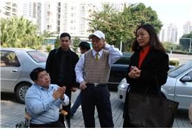 广东省青基会与环球基金会至残友参观